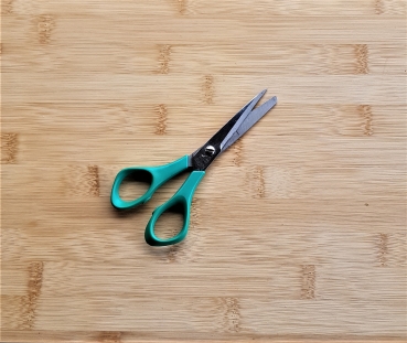 Papierschere-Klein schärfen